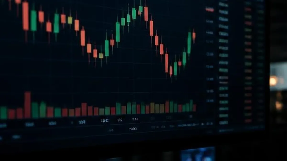 Green and red candlestick charts glowing on a trading screen in a dark office